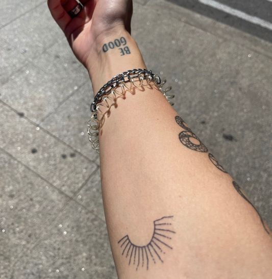 Tijdelijke tattoo zon